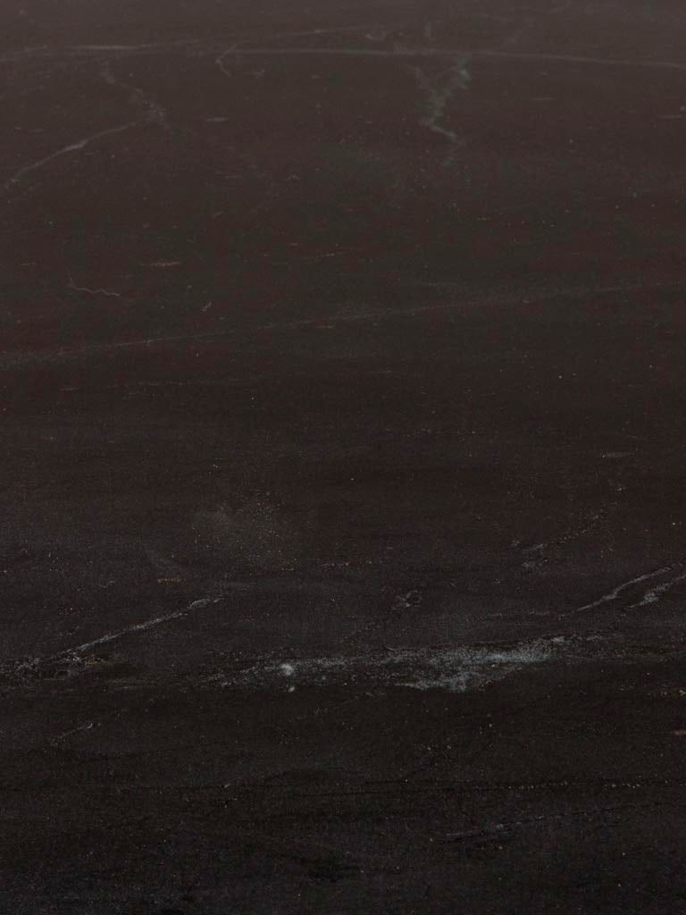 Black marble counter with sliding table